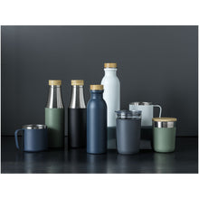 Load image into Gallery viewer, Hulan 540 ml copper vacuum insulated stainless steel bottle with bamboo lid — lifestyle