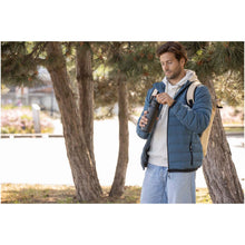 Load image into Gallery viewer, Astra 600 ml RCS recycled stainless steel copper vacuum insulated water bottle (carbonated safe) — lifestyle