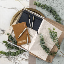 Load image into Gallery viewer, Atlana leather pieces notebook — lifestyle