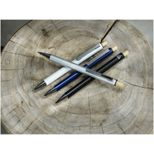 Load image into Gallery viewer, Cyrus recycled aluminium ballpoint pen (blue ink) — lifestyle