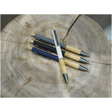 Load image into Gallery viewer, Darius recycled aluminium ballpoint pen (blue ink) — lifestyle