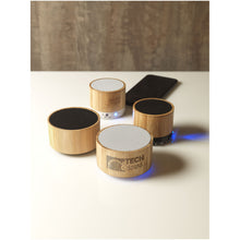 Load image into Gallery viewer, Cosmos bamboo Bluetooth speaker — lifestyle
