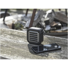 Load image into Gallery viewer, Solo 3W IPX5 RCS recycled plastic solar Bluetooth speaker with carabiner  — lifestyle
