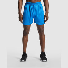 Load image into Gallery viewer, Player 140 g/m² unisex sports shorts — lifestyle