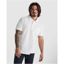 Load image into Gallery viewer, Centauro Premium 220 g/m² short sleeve unisex polo — lifestyle